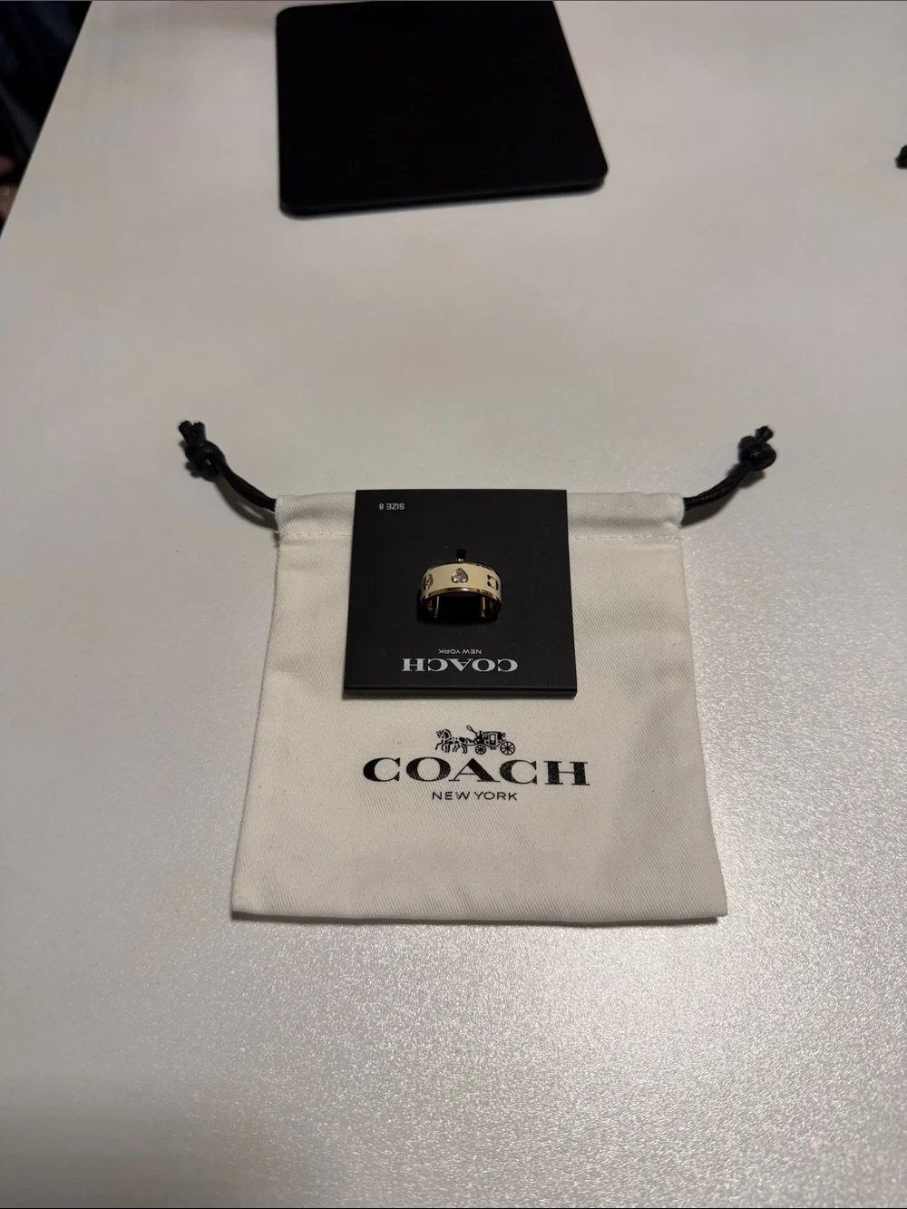 Coach Gold-Tone Men's Ring with Black Stud Accents